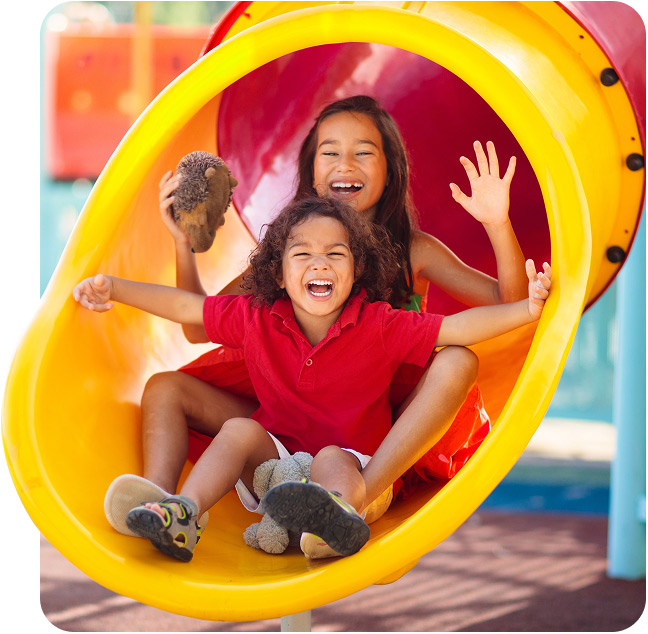 Kids going down a slide.