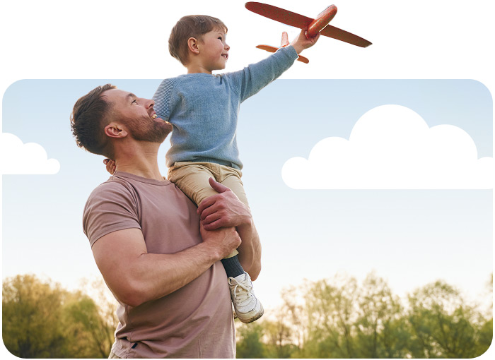 Child and parent with a toy airplane.